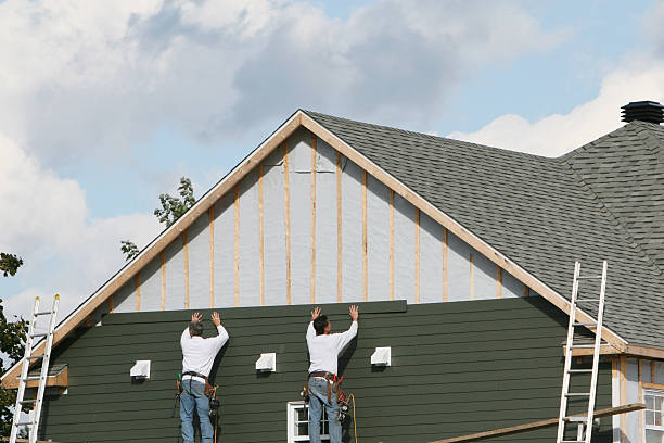 Professional Siding technician working in Hopkinton, MA